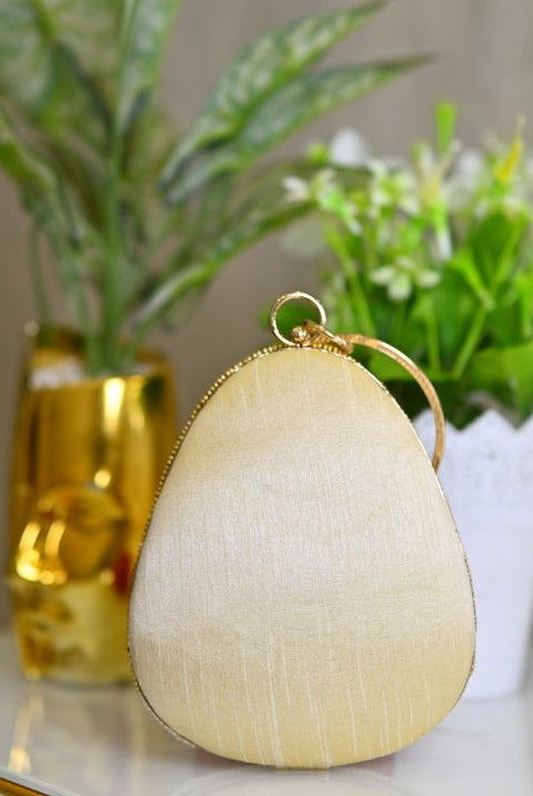 Almond Clutch with Bangle Styled Handle - RajsiPoshak