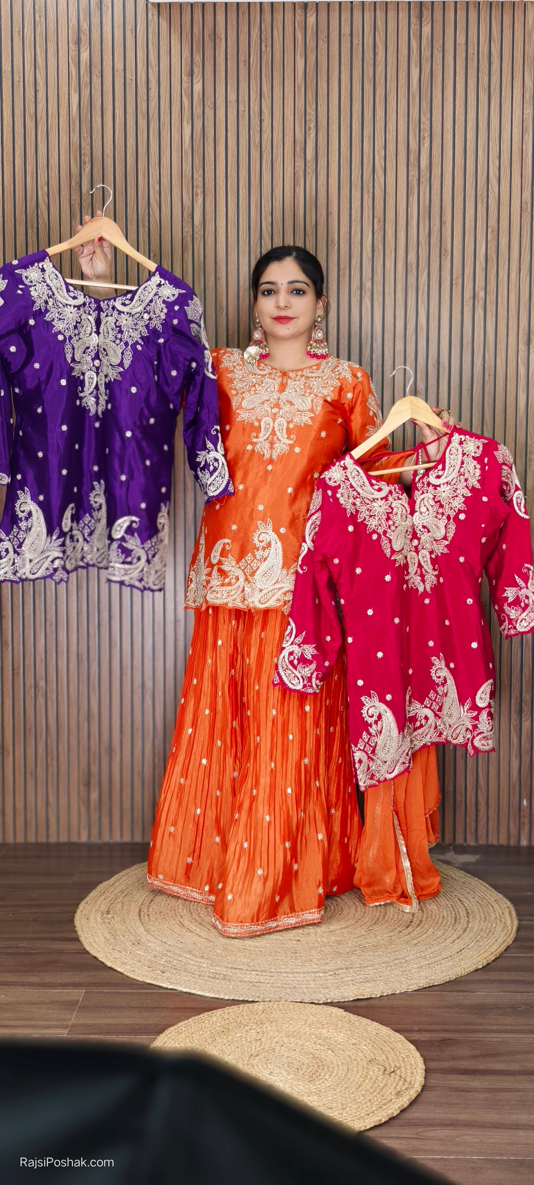 ORANGE,PURPLE & PINK SHARARA SUIT FEATURING INTRICATE ALL-OVER ZARDOZI AND MOTI EMBROIDERY ON THE SHIRT, WITH MATCHING BOOTIES SCATTERED ACROSS THE ENTIRE DUPATTA